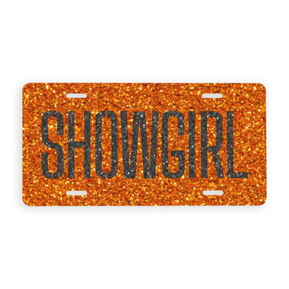 Orange glittery license plate with 'SHOWGIRL' text on a white background