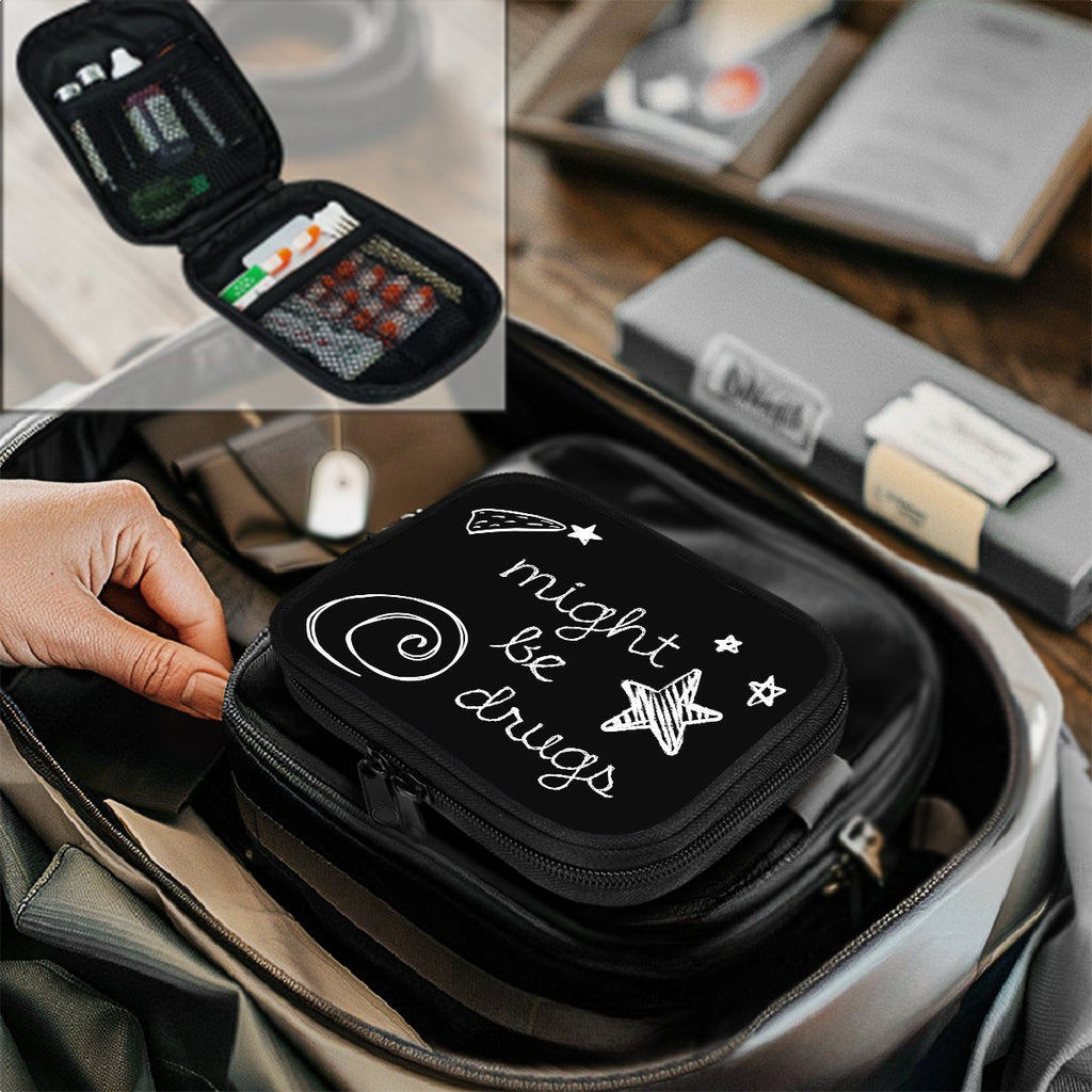 Black case with 'might be drugs' text inside a bag, close-up of contents.