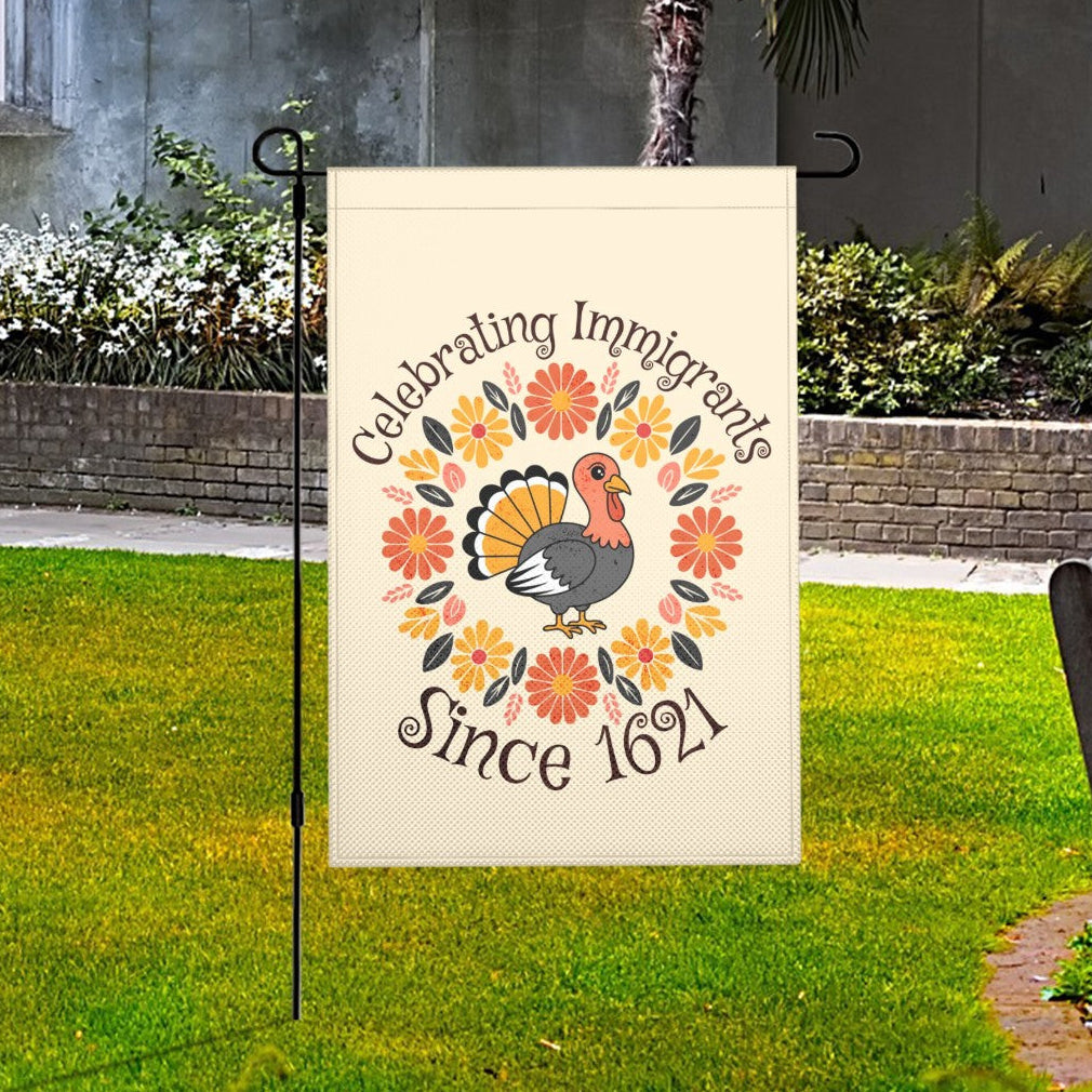 Garden flag with a turkey design and text on a grassy area