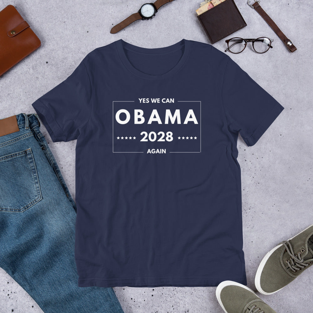 Photograph of a white unisex t‑shirt with bold navy text